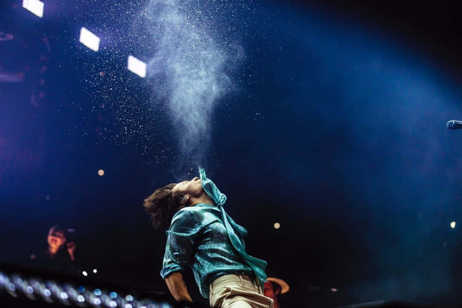 Harry Styles Getting Work Done On His Laptop! Wallpaper