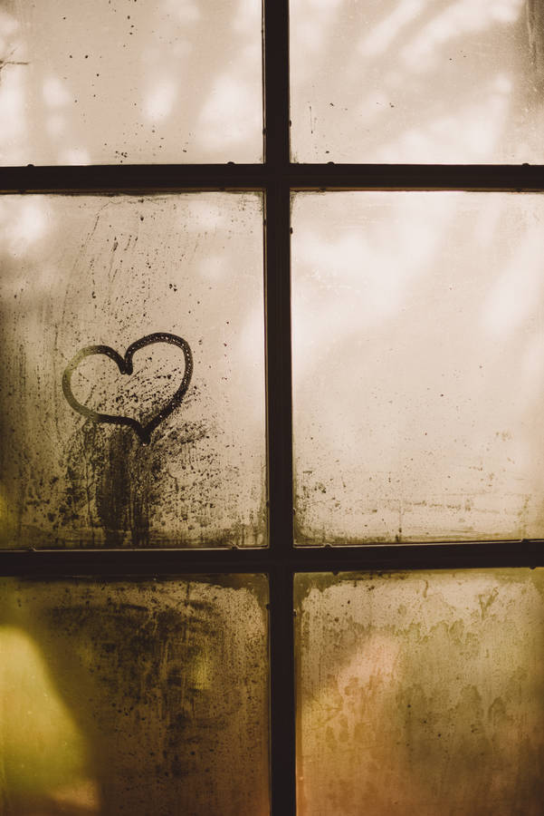 Heart on window wallpaper