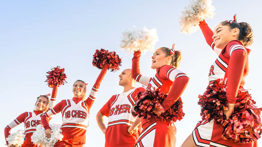 High School Cheerleading Team Spirit Wallpaper