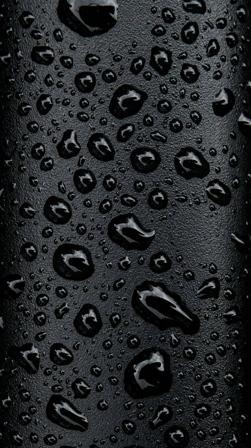 Illuminated Urban Nightscape - Capturing The Essence Of Cool Black Wallpaper