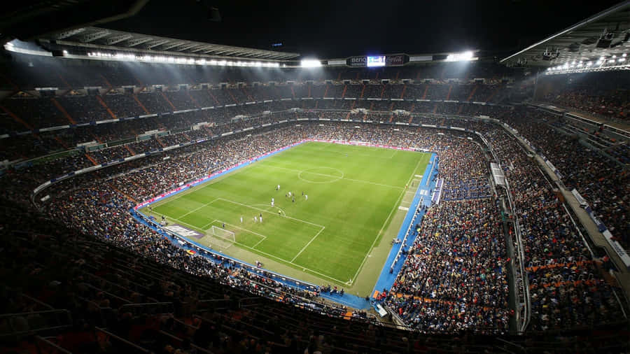 Image Large And Vibrant Soccer Stadium On Game Day Wallpaper