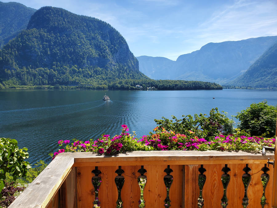 Download wallpaper 938x1668 lake, mountains, village, hallstatt, austria  iphone 8/7/6s/6 for parallax hd background