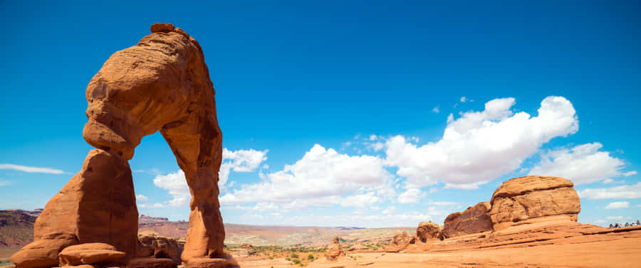 Large Clouds And An Arch Wallpaper