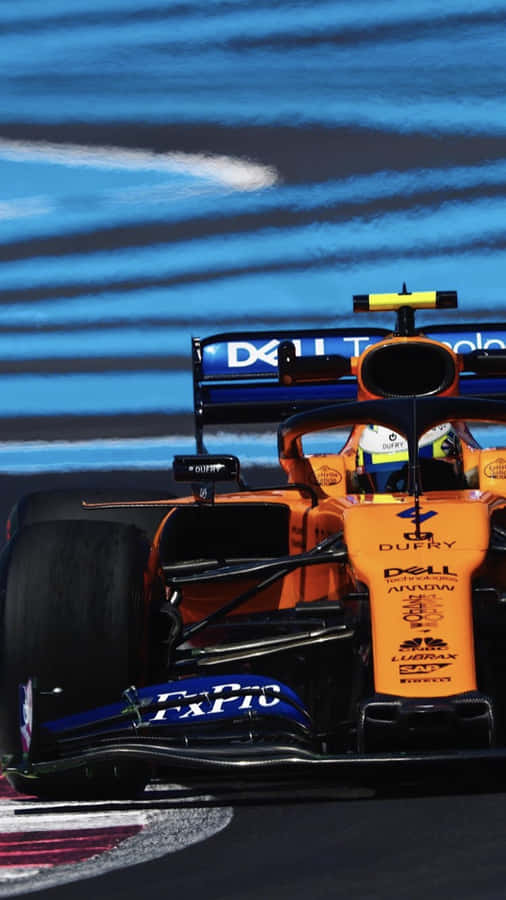 Lewis Hamilton On The Track In A Mclaren Formula 1 Racecar Wallpaper