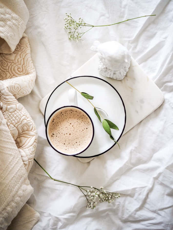 Life Is Better In Winter Time. Cozy Up In An Armchair With A Hot Cup Of Tea And Enjoy The Winter Season. Wallpaper