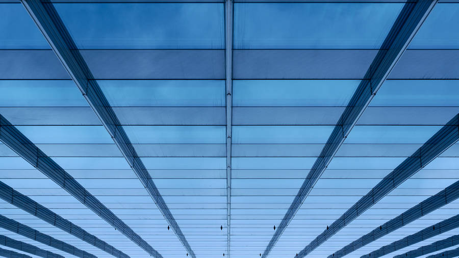 Light Blue Plain Glass Skyscraper Exterior Wallpaper