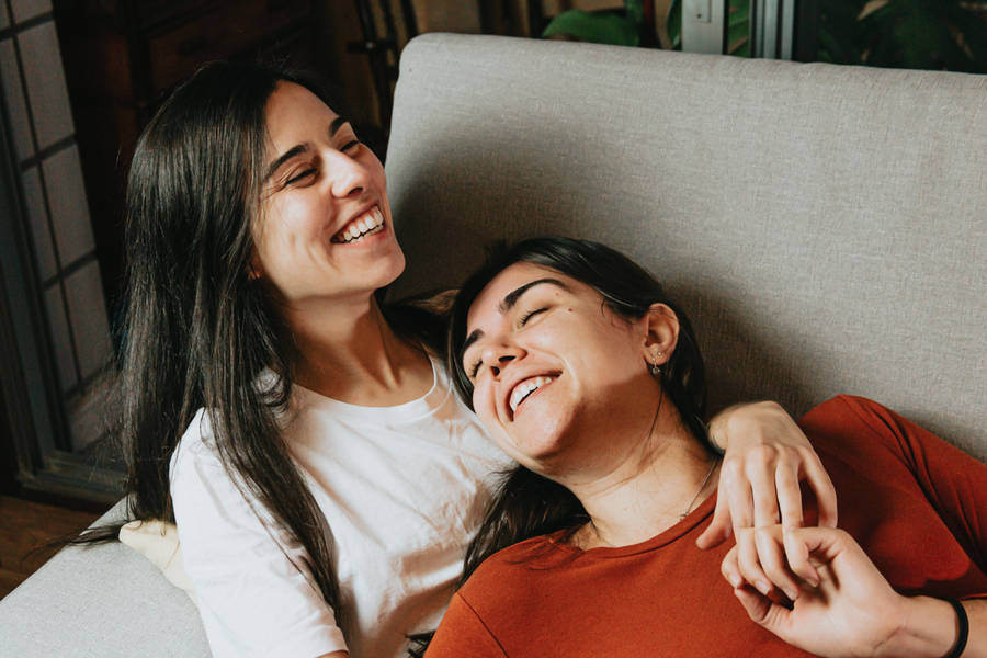 Love And Friendship On Couch Wallpaper