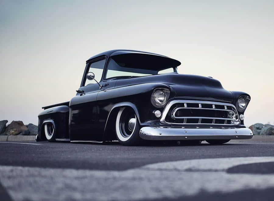 Low Truck Sitting On Highway Wallpaper