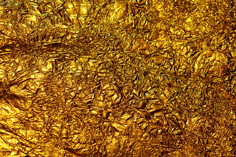 Make A Bold Statement With Metallic Gold Wallpaper