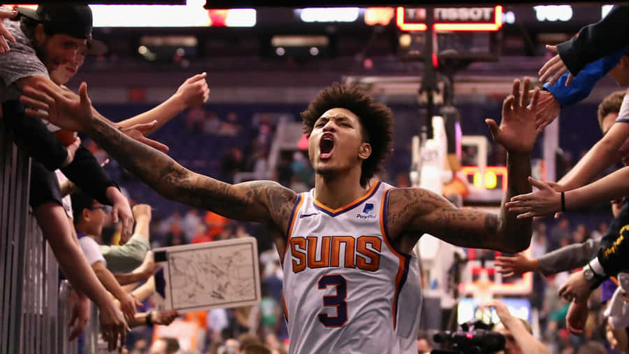 Nba All-star Kelly Oubre Jr. Getting Ready To Shoot A Three Pointer Wallpaper