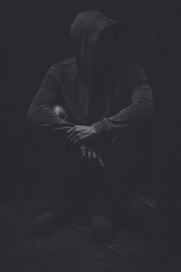 Nf Performing On Stage At A Live Show Wallpaper