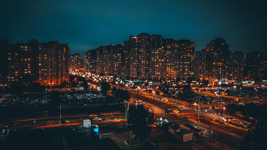 Orange Lights In The Dark City 4k Wallpaper