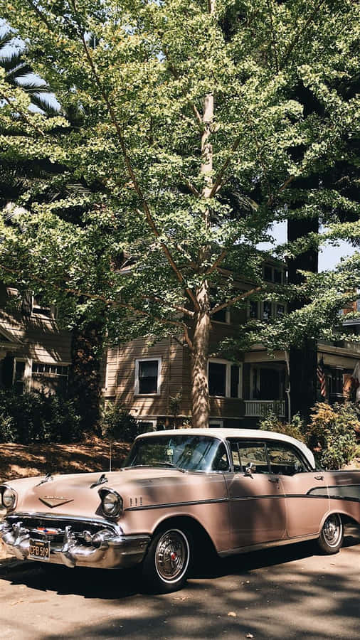 Pink Vintage Car Parked Iphone Wallpaper