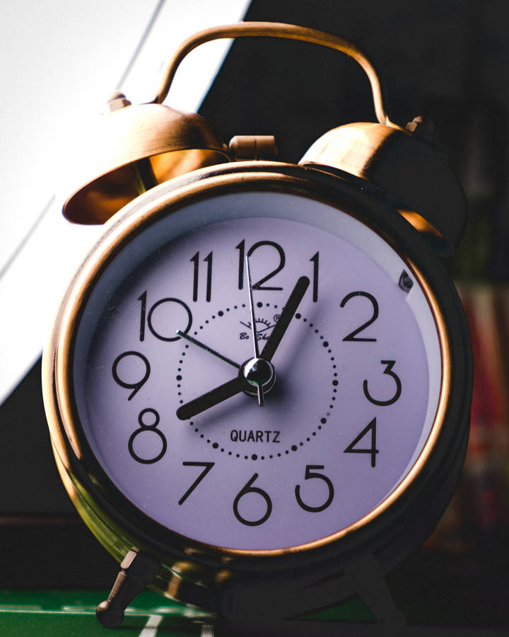 Alarm clock amidst vast snow field, resonating with the snowy background's  calmness. Vertical Mobile Wallpaper AI Generated 30464921 Stock Photo at  Vecteezy