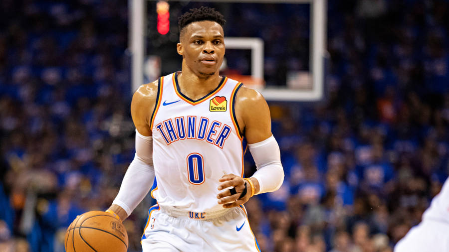 Russell Westbrook Dribbling The Ball Wallpaper