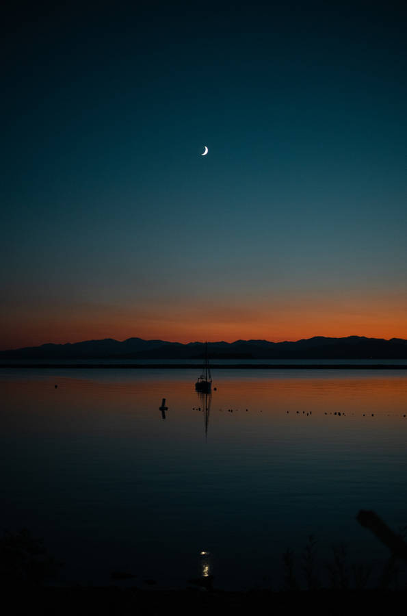 Sailing Under Half-crescent Moon Wallpaper