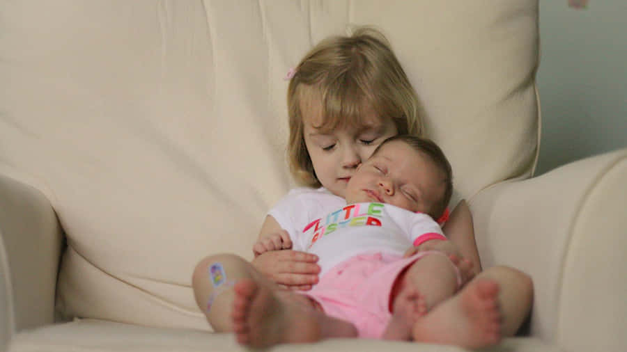Siblings Bonding Moment Wallpaper
