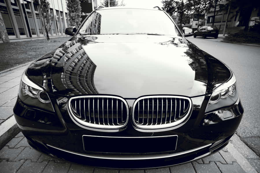 Sleek Black Sedan Closeup Wallpaper