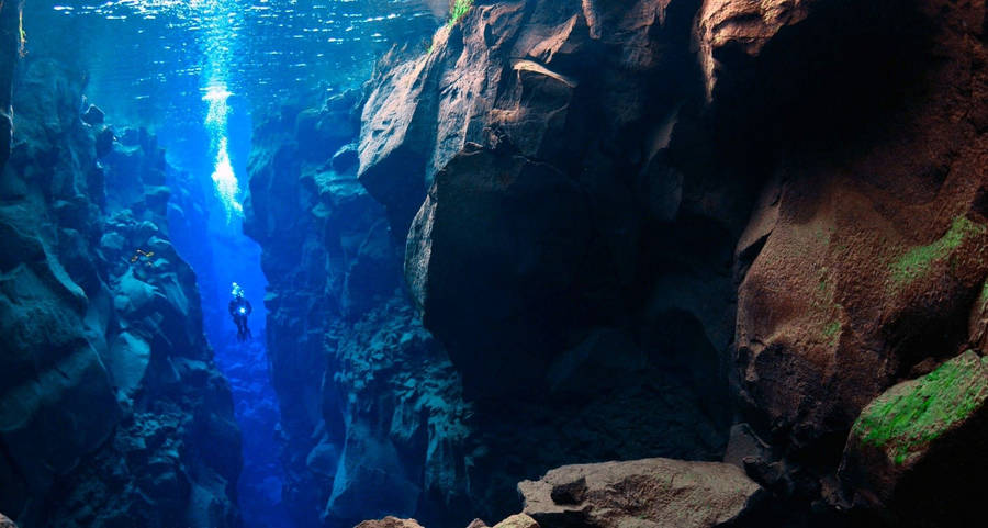 Snorkeling Between Silfra Wallpaper