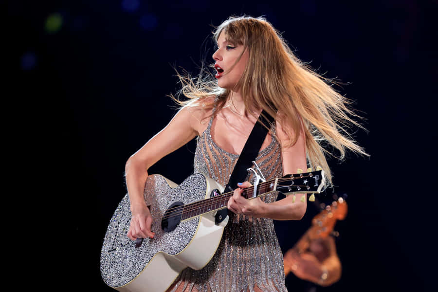 Sparkling Guitar Performance Wallpaper