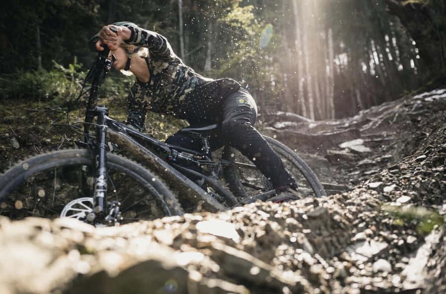 Specialized Mountain Bike In Muddy Road Wallpaper