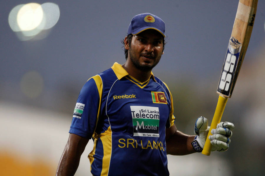 Download Sri Lanka Cricketer Passionately Playing Wallpaper | Wallpapers.com