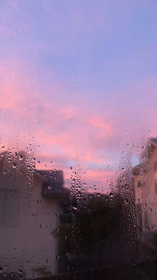 Stay Warm And Stay Dry Under The Aesthetic Rain. Wallpaper