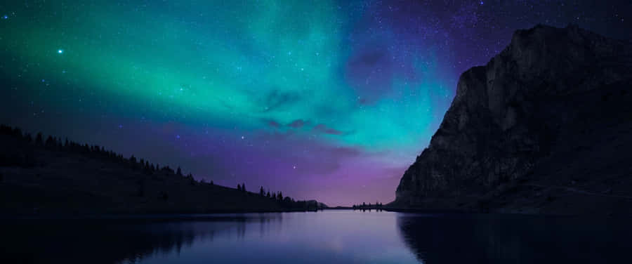 Stunning Night Sky Lit Up With Millions Of Stars Wallpaper