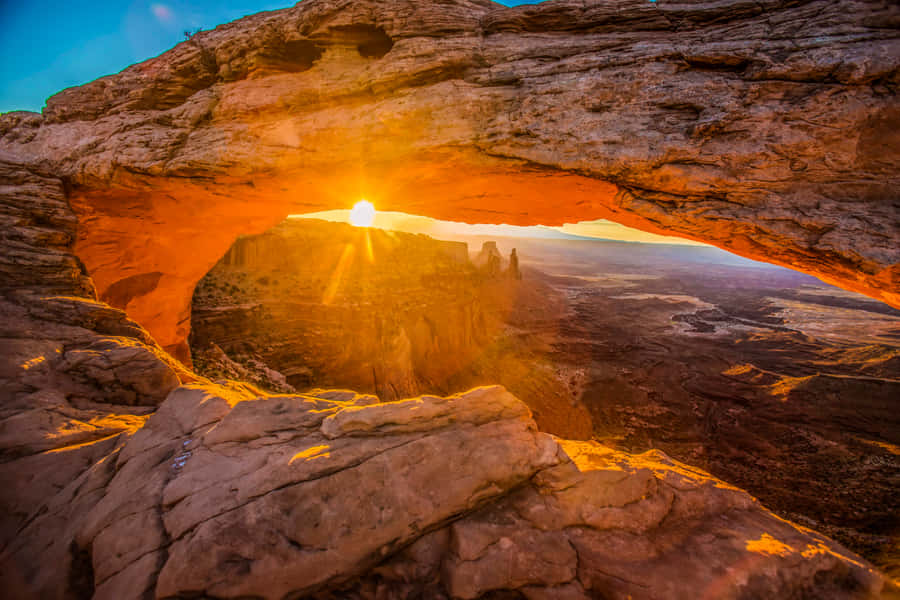 Sunshine Peeking Through An Arch Wallpaper