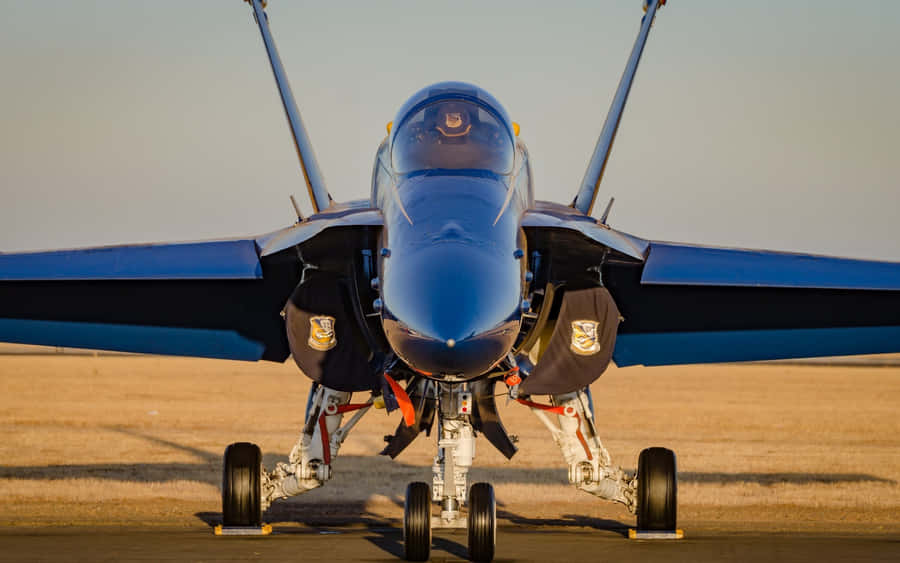 Take Flight With The Famous Blue Angels Wallpaper