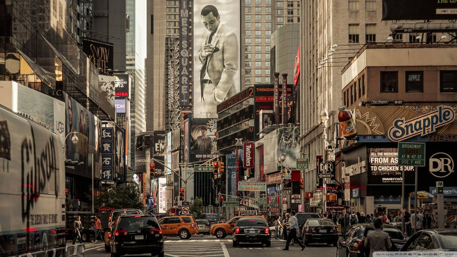Take In The Bright Lights And Sounds Of Historic New York City Wallpaper