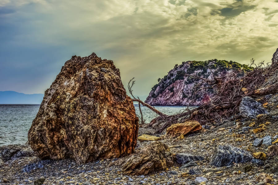 Take In The Scenery Of The Rocky Beach Wallpaper