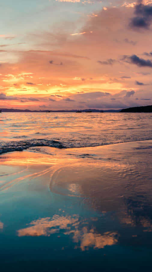 The Beauty Of A Sunset Beach On An Iphone Wallpaper