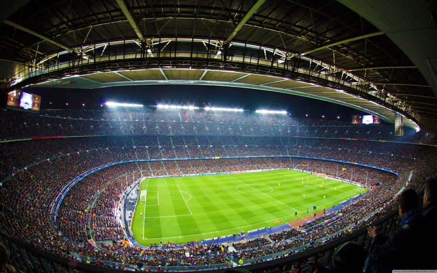 Thousands Flock To The Soccer Stadium To Cheer On Their Favorite Team Wallpaper