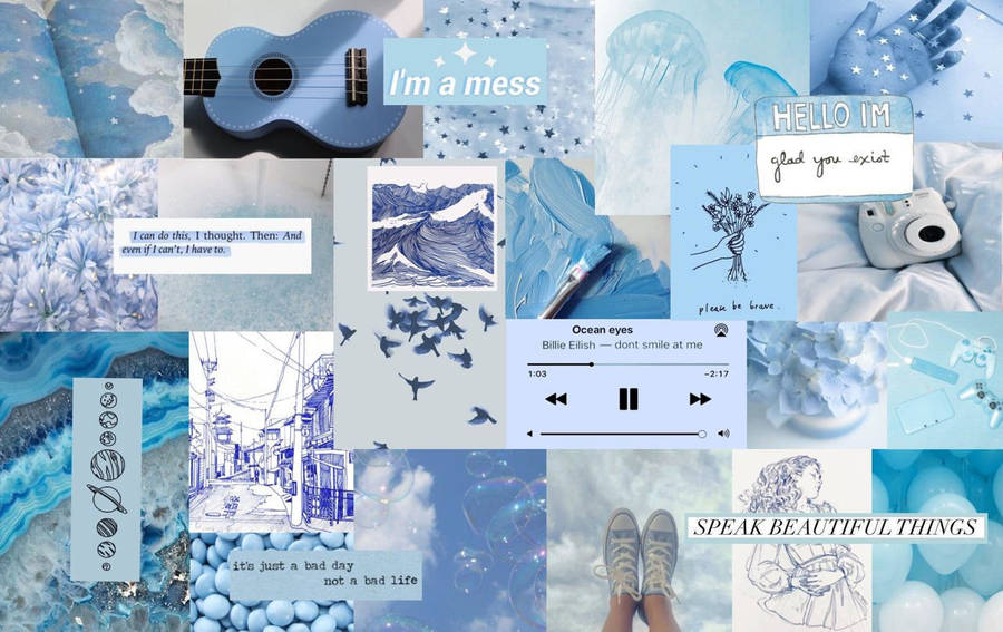 Thrive In Your Own Inner World With A Laptop Adorned In Blue Aesthetic. Wallpaper