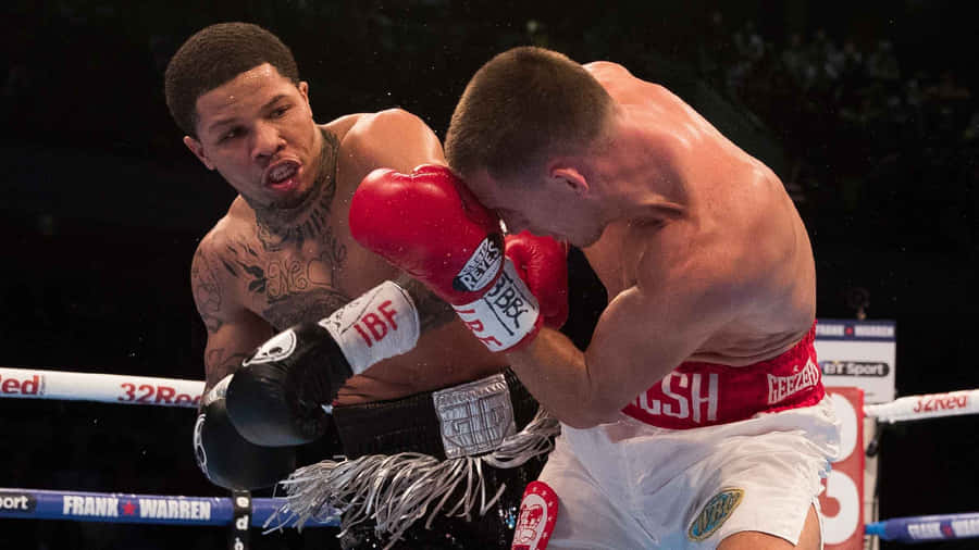 Two Boxers In The Ring Fighting Each Other Wallpaper