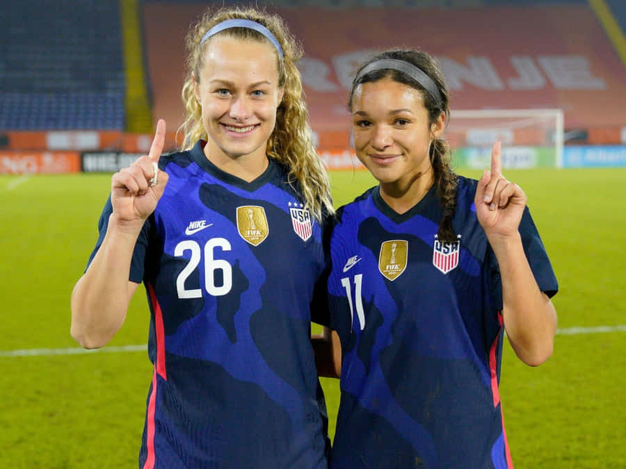 U S A Soccer Players Celebrating Victory Wallpaper