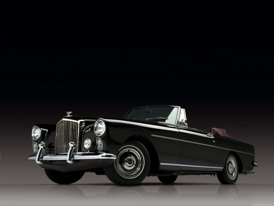 Vintage Bentley Awaits – Stunning Classic Car Wallpaper