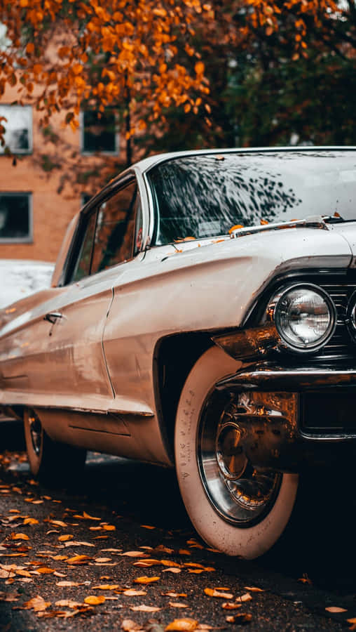 Vintage Car With Autumn Leaves Iphone Wallpaper