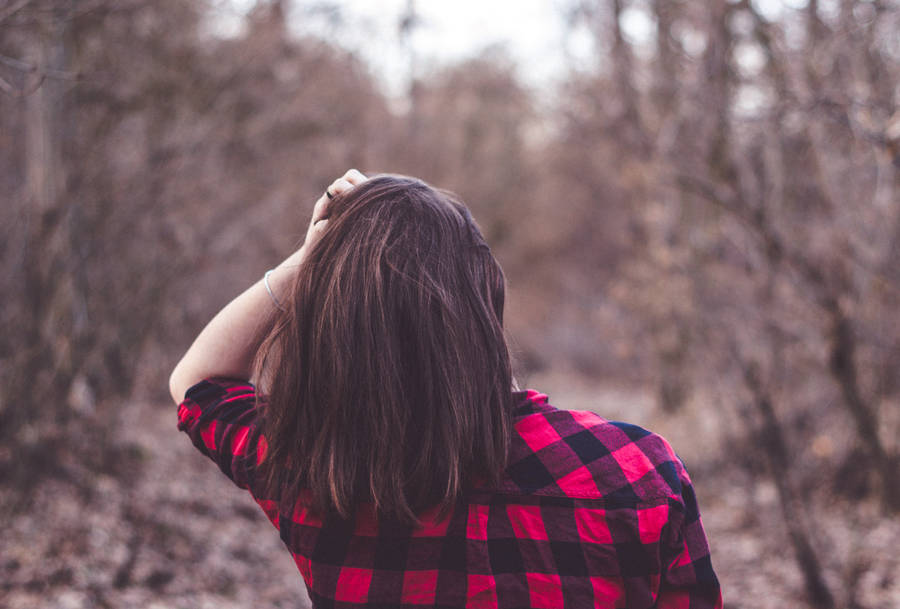 Woman In Checkered Polo Shirt Wallpaper