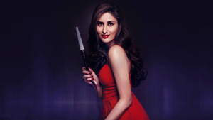 1080p Hd Kareena Kapoor Holding Knife Wallpaper