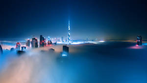 1920 X 1080 Night City Foggy Burj Khalifa Wallpaper
