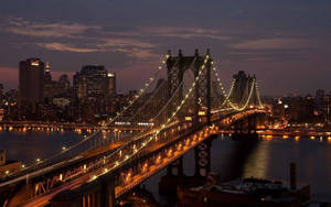 1920 X 1080 Night City Manhattan Bridge Wallpaper