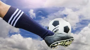 2560x1440 Soccer Ball Kicked Wallpaper