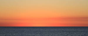 3440x1440 Minimalist Orange Sea Skies Wallpaper