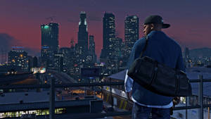 4k Gta 5 Franklin Looking At City At Night Wallpaper