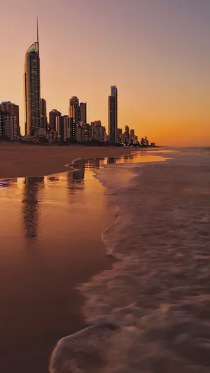 4k Iphone City During Sunset On Beach Wallpaper