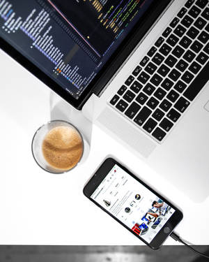 4k Programming Laptop With Coffee Wallpaper