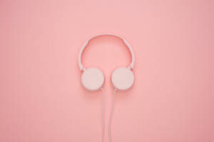 4k Tablet Pink Headphones Wallpaper
