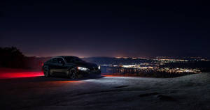 4k Ultra Hd Black Car At Night Wallpaper